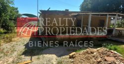EXTENSO TERRENO CON CONSTRUCCIÓN EN VENTA